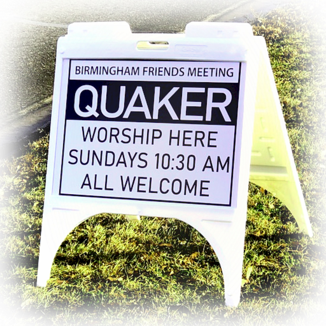 Sign reading Quaker Worship Here, Sundays 10:30 AM, All Welcome